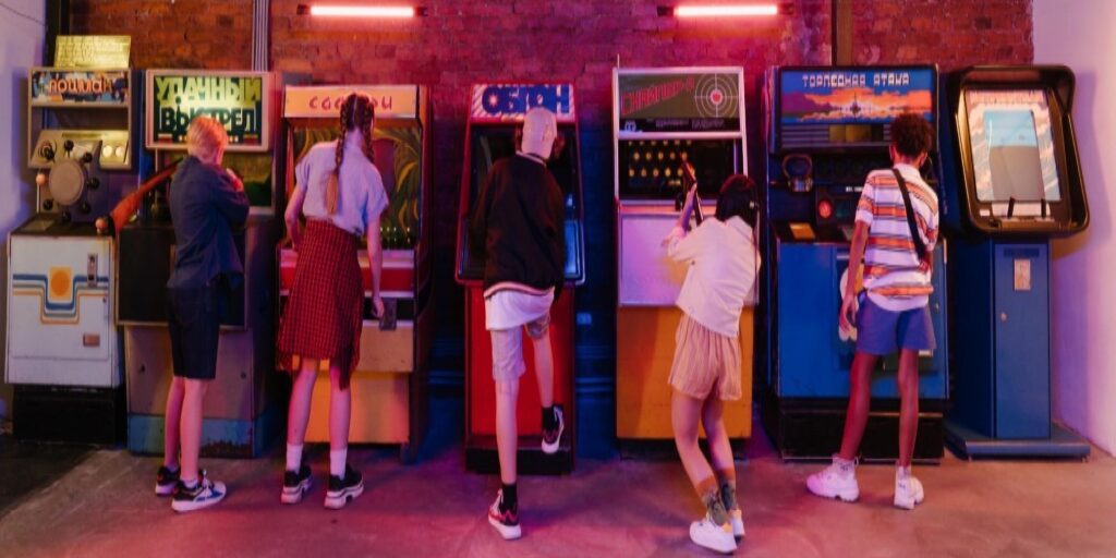 Shot of kids playing in an arcade.